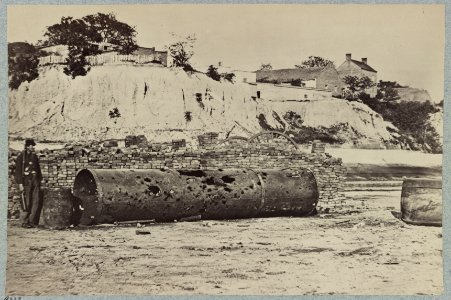 Smoke-stack of Confederate iron-clad Virginia on wharf at Richmond, Va., showing effect of shot in attack on Federal batteries on James River LCCN2013647367