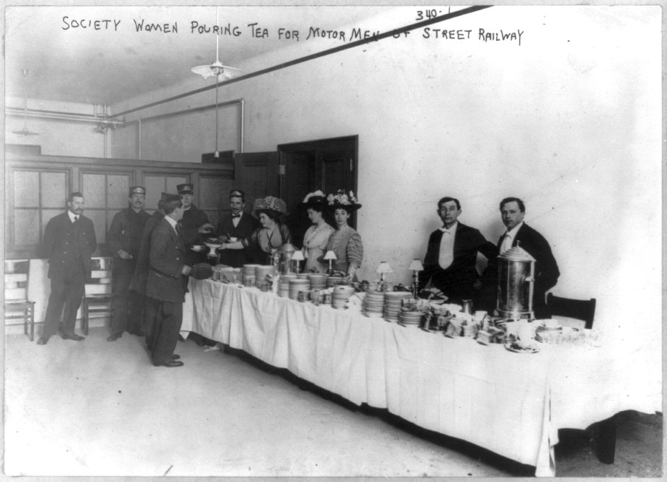 Society women pouring tea for motormen of street railway LCCN2007683146