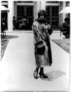 Society woman, full-length portrait, in fur coat LCCN89713496