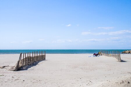 Sand ocean sky photo