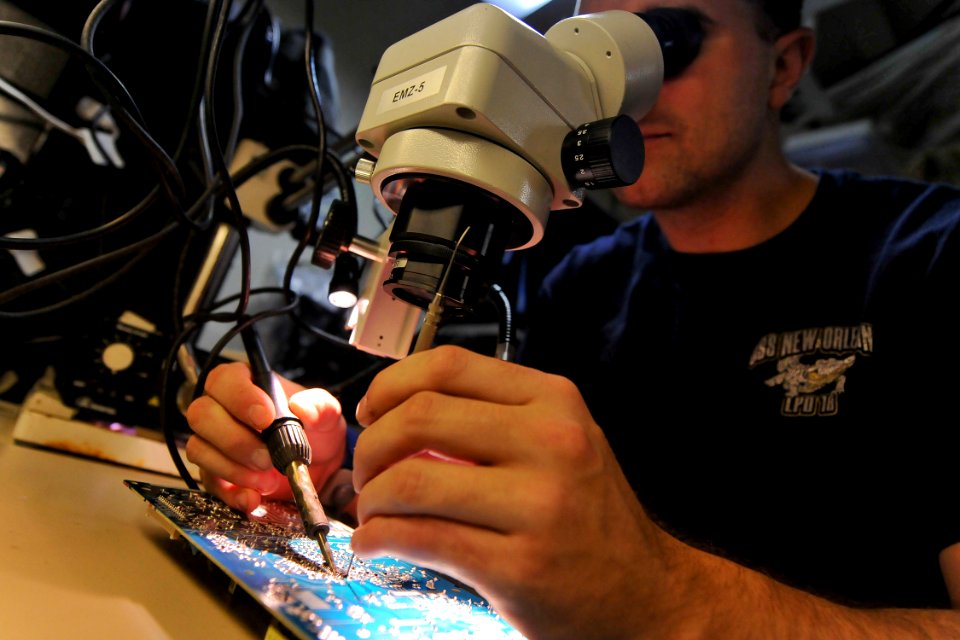 Soldering microchip 131205-N-YR391-018