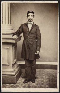 Soldier named Garrison in uniform next to column LCCN2012647064