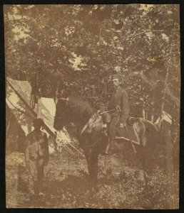 Soldier on horseback with African American servant LCCN2010647714