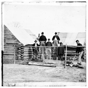 Soldier chopping wood in camp LOC cwpb.02021