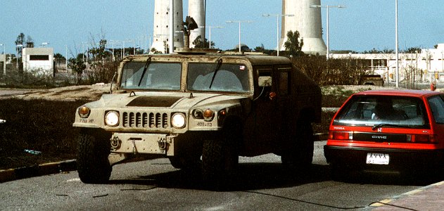 Soldiers drive an M1038 HMMWV in Kuwait