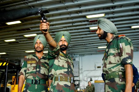 Soldier Sikh LI INF of the Indian Army practices aim during MALABAR 2006