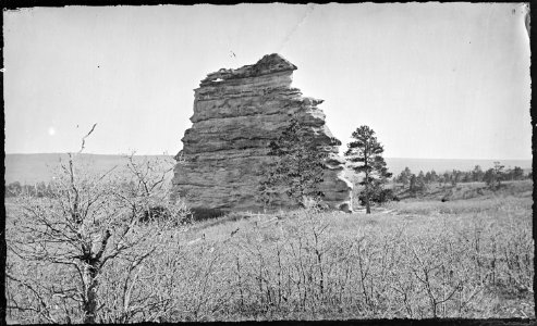 Solitary butte of sandstone, in valley of Monument Creek. El Paso County, Colorado. - NARA - 517069