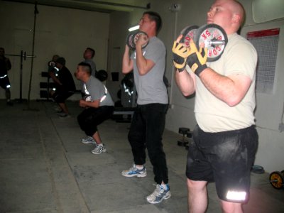 Soldiers work-out in their new gym photo