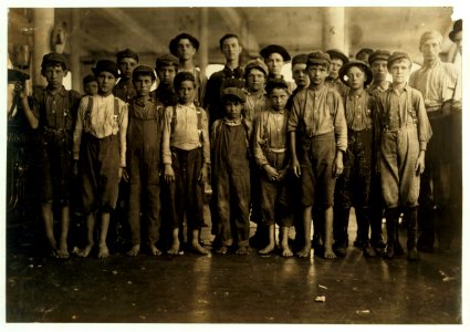 Some of the doffers in the Washington Cotton Mills, Fries, Va. The smallest one said he was 15 years old but, for that matter, they are all 'wise' to the necessity for being at least 14. All LOC nclc.02069