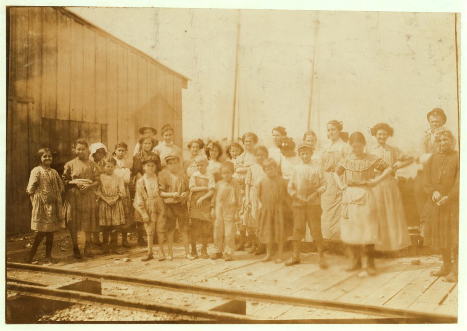 Some of the shrimp-pickers in an Oyster Co. The bosses refused to allow the children to be in the photo, so I was compelled to wait until they had gone home to dinner, before I could get LOC nclc.00896
