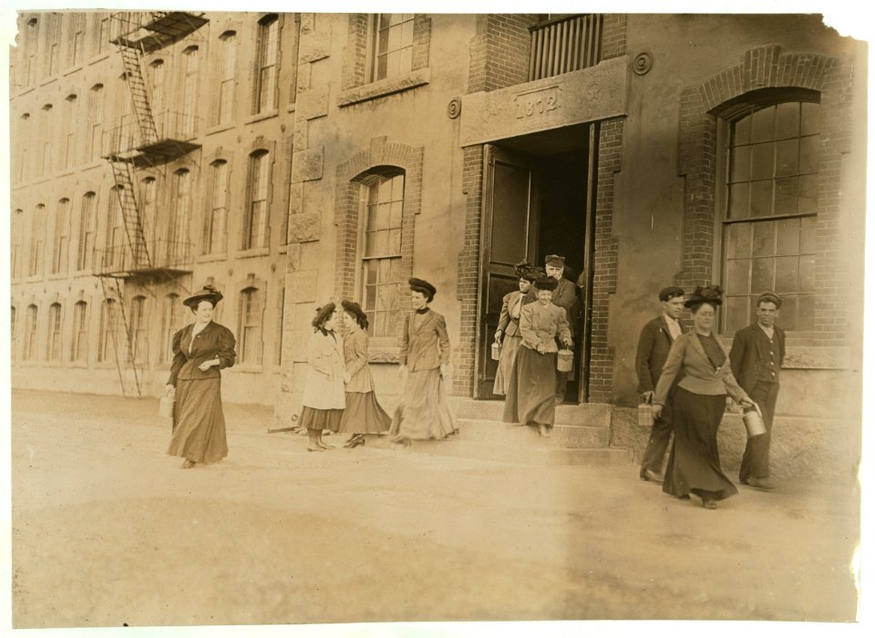 Some of the workers (not the youngest) leaving the Coventry Co., Mill, Anthony, R. I. 6 P.M. April 16, 1909. LOC nclc.01662
