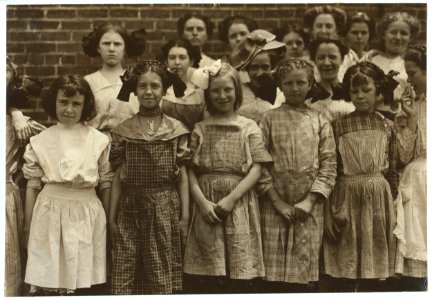 Some of the young girls who roll cigarettes in the Danville (Va.) Cigarette Factory. I could not induce the very smallest ones to get into the photos. See other photos taken at noon and in LOC nclc.04751