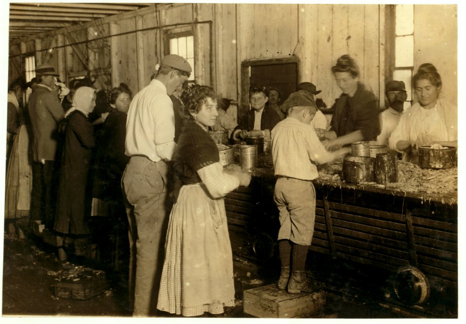 Some of the young shrimp-pickers at Dunbar, Lopez, Dukate Co., Sore, swollen, and even bleeding fingers are common among these workers on account of the acid in the shrimp. LOC cph.3a01049