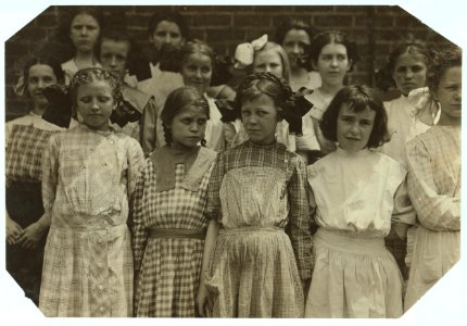 Some of the young girls who roll cigarettes in the Danville (Va.) Cigarette Factory. I could not induce the very smallest ones to get into the photos. See other photos taken at noon and in LOC nclc.04750