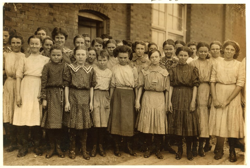 Some of the spinners in Pell City Cotton Mills, grouped for me by the Overseer. Mr. E. A. Thompson, Superintendent of the Mill, is also Mayor of Pell City. LOC cph.3b31139