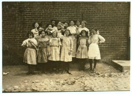 Some of the young girls who roll cigarettes in the Danville (Va.) Cigarette Factory. I could not induce the very smallest ones to get into the photos. See other photos taken at noon and in LOC nclc.04748