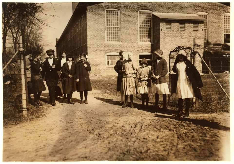 Some of the youngsters in the Scotland Neck Cotton Mill going home to dinner. This mill has a number of children. One boy told me 10 years old, and one 7. LOC nclc.02954