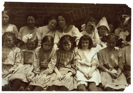 Some of the young girls who roll cigarettes in the Danville (Va.) Cigarette Factory. I could not induce the very smallest ones to get into the photos. See other photos taken at noon and in LOC nclc.04752
