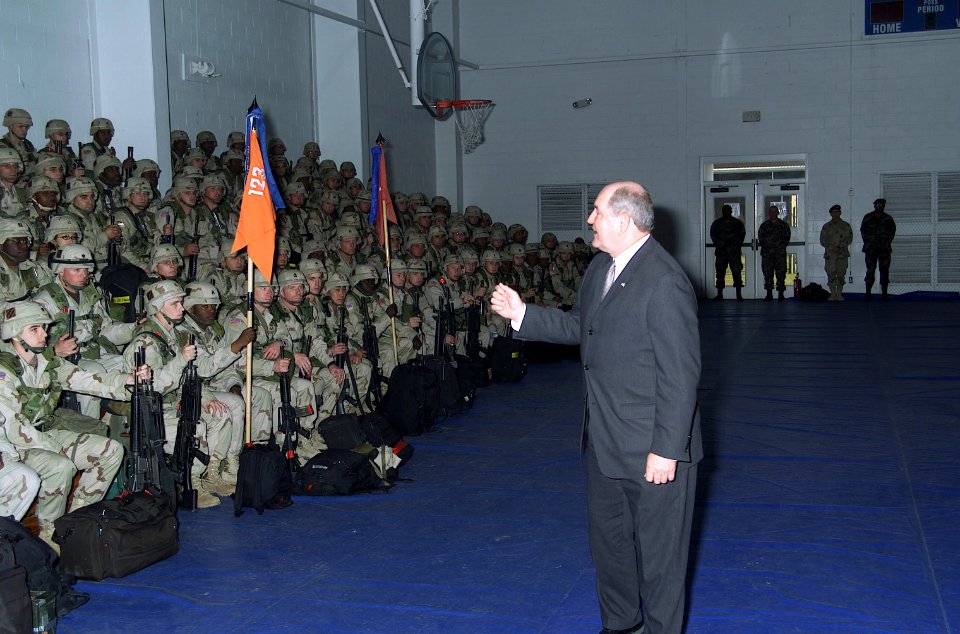 Sonny Perdue addresses U.S. Army Soldiers from the 123rd Signal Battalion at Caro Gymnasium