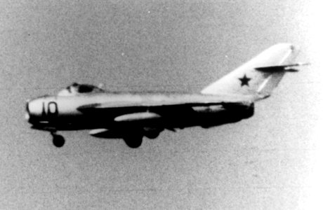 Soviet MiG-17 in flight with extended landing gear