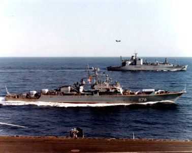 Soviet Krivak II frigate underway next to USS Kiska (AE-35), circa in the 1980s