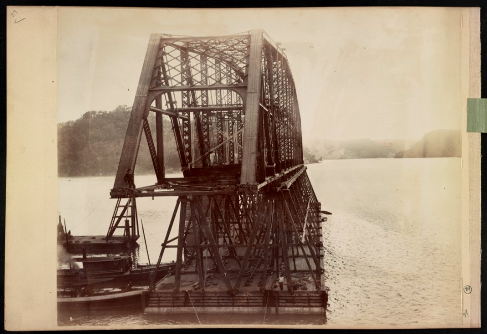 Span number 5 of Hawkesbury River Railway Bridge, New South Wales, Australia, atop timber framework on pontoon, being pushed by small boats) - C. Bayliss photo, Sydney LCCN2016651666