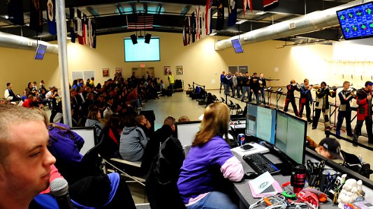 Spectators watch Navy Junior ROTC cadet finalists compete photo