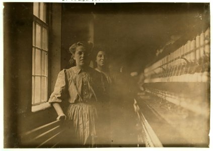 Spinners and doffers in the Interlaken Mill, Arkwright, R. I. Girl in front, Amelia, is a spooler. Small Mill. LOC cph.3c05999