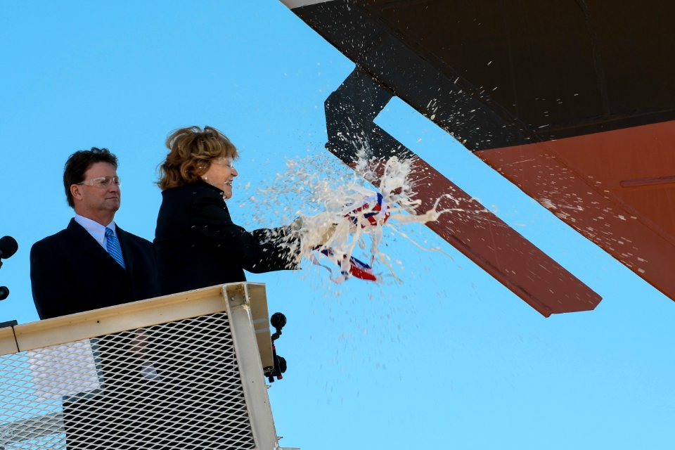 Sponsor of USS Wichita (LCS-13) smashes champagne bottle over bow of ship during christening ceremony US Navy 160917-N-N0101-100