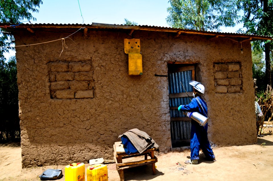 Spraying a house to protect residents from malaria (9499460689)