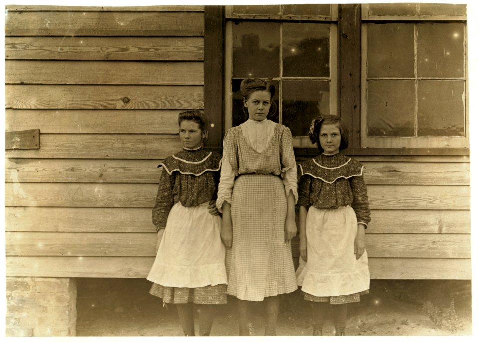 Springstein Mills, Chester, S.C. Maggie Wooten (Largest), creels on warper. Lillie Anderson-Oldest of two sisters. Been in mill five years. Runs only 4 sides. Minnie Anderson, - youngest- LOC nclc.01425