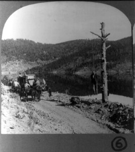 Stage coach robbery)- Gone over the big trail LCCN2003688462
