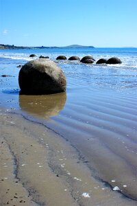 Moeraki boulders new zealand beach photo