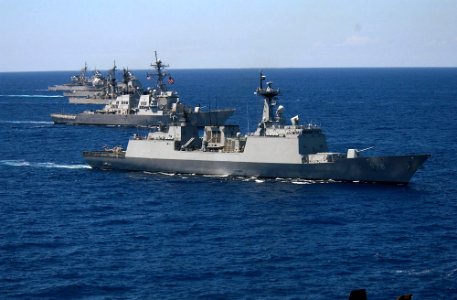 Starboard bow view of international group of ships underway at the conclusion of RIMPAC 2004 including ROKS Chungmugong Yi Sun-sin (DDH-975) and USS John Paul Jones (DDG-53) 040722-N-1513W-202