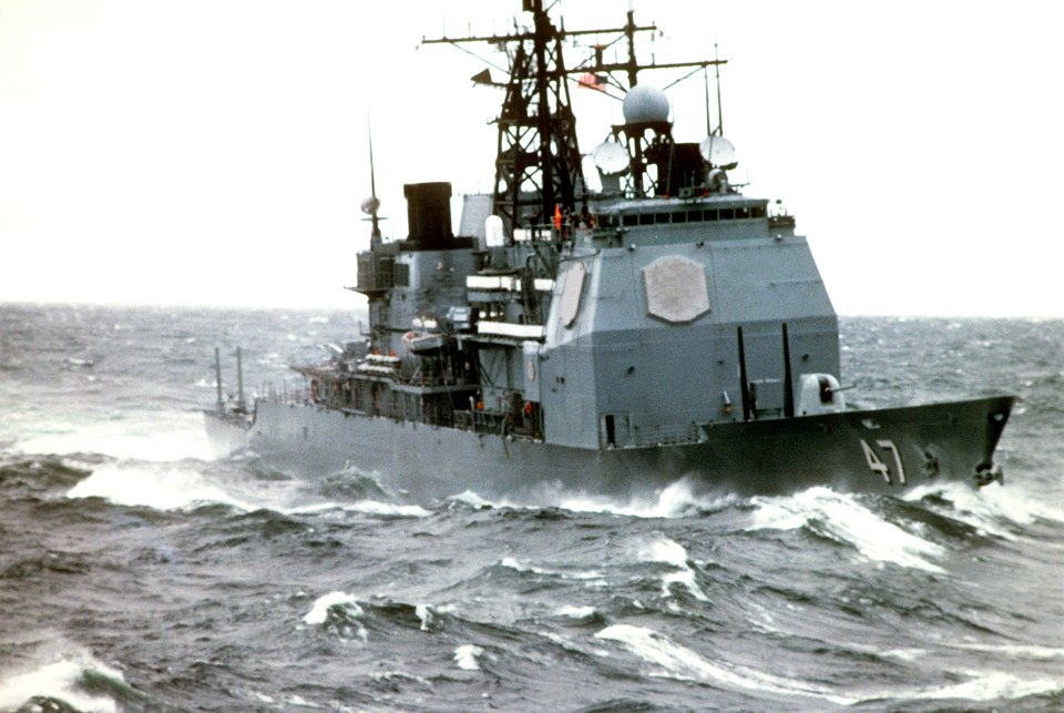 Starboard bow view of USS Ticonderoga (CG-47) underway in rough seas BALTOPS 1985 DN-ST-86-02754
