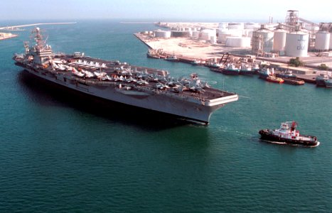 Starboard bow view of USS George Washington (CVN-73) being assisted by tug at Jebel Ali 2000 DN-SD-02-09457