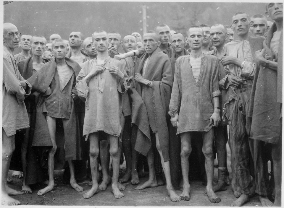 Starved prisoners, nearly dead from hunger, pose in concentration camp in Ebensee, Austria. The camp was reputedly... - NARA - 531271