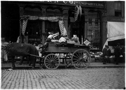 Starting in business early. Selling vegetables in the market. Boston, Mass. - NARA - 523224 photo