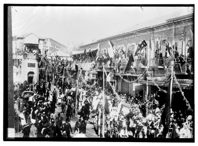 State visit to Jerusalem of Wilhelm II of Germany in 1898. General view of Jaffa Road, crowded with people and flags, during procession. LOC matpc.04611