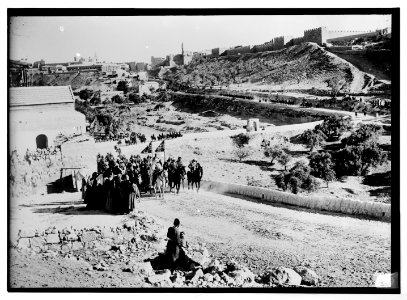 State visit to Jerusalem of Wilhelm II of Germany in 1898. Emperor riding with group; The Citadel, and west city wall are in background. LOC matpc.04612