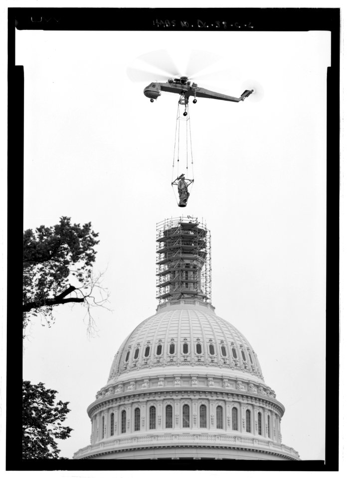 Statue of freedom airlifted off of the dome