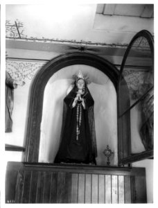 Statue of Nuestra Senora (Our Lady of Sorrow) at the Presidio Church at Mission San Carlos Borromeo, Monterey, ca.1906 (CHS-4151)