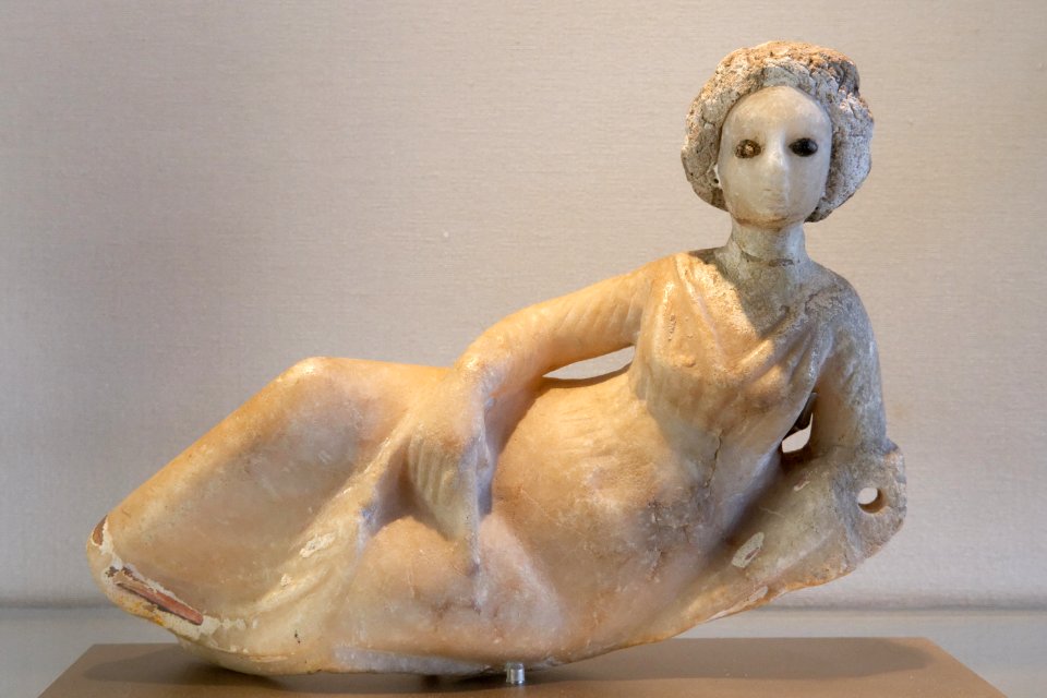 Statuette of a reclining woman Louvre AO20130