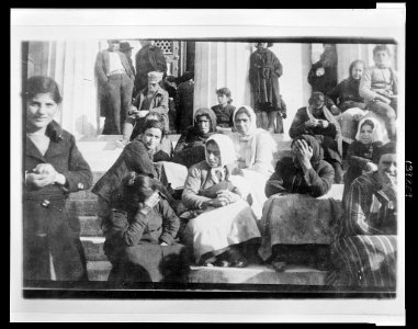 Steps of the palace Two of the refugee women tried to prevent their faces from showing in the picture. LCCN2010650541 photo