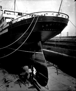 Stern view of the 'Aquitania' (1914) in drydock RMG G10802