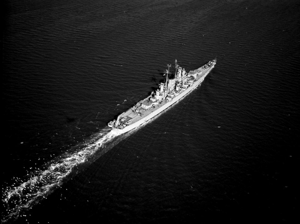 Stern view of USS Newport News (CA-148) underway c1949