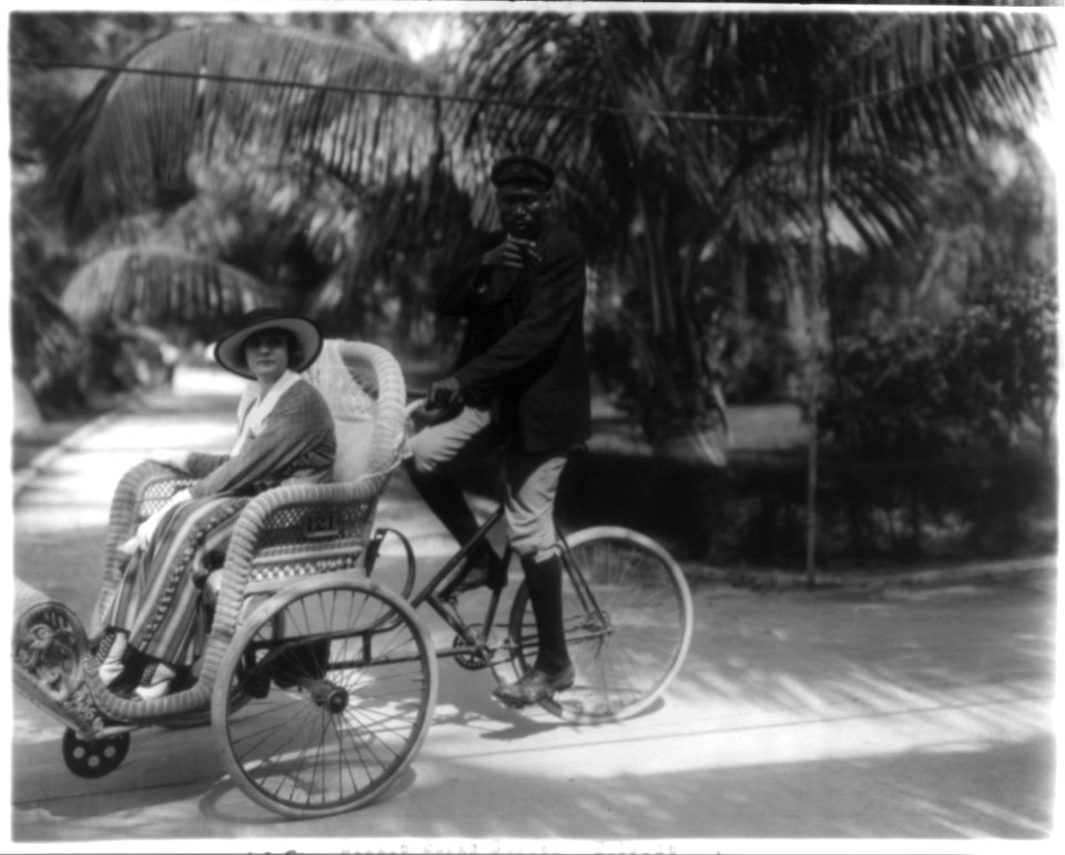 Stills of Billie Burke starring in motion picture, Gloria's Romance, 1916- being driven in bicycle sedan chair (108) LCCN2004676525