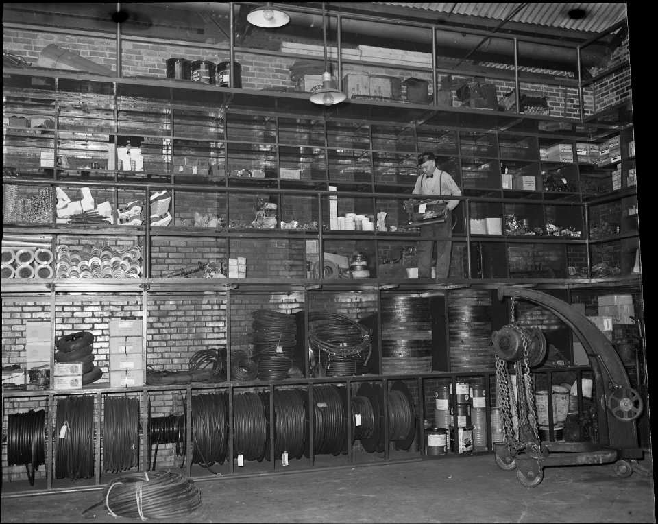 Stock room in machine and repair shop. The Pocahontas Corporation, Mines 33-34, Bishop, Tazewell County, Virginia. - NARA - 541078