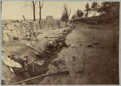 Stone wall at foot of Marye's Heights, Fredericksburg, Va. at the front carried by 6th Maine Infantry, May 3, 1863. Photographed twenty minutes after storming party had (...) up the hill LCCN2012647842