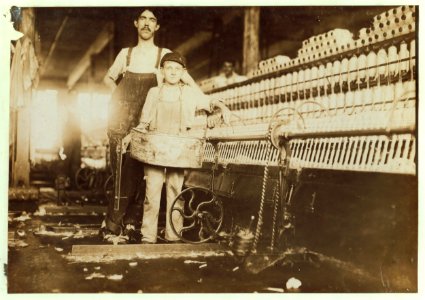 Street Bretzau, who is a 'Tube-boy' in the mule-room of Richmond Spinning Mill, East Lake. Mule spinning is apparently more dangerous than ring spinning. (See bandaged finger.) Photo during LOC cph.3a26043